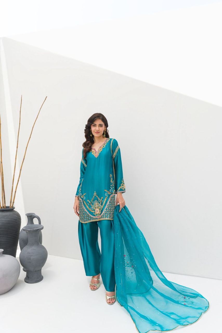 A serene sea green ensemble crafted in Pure Sheesha Silk