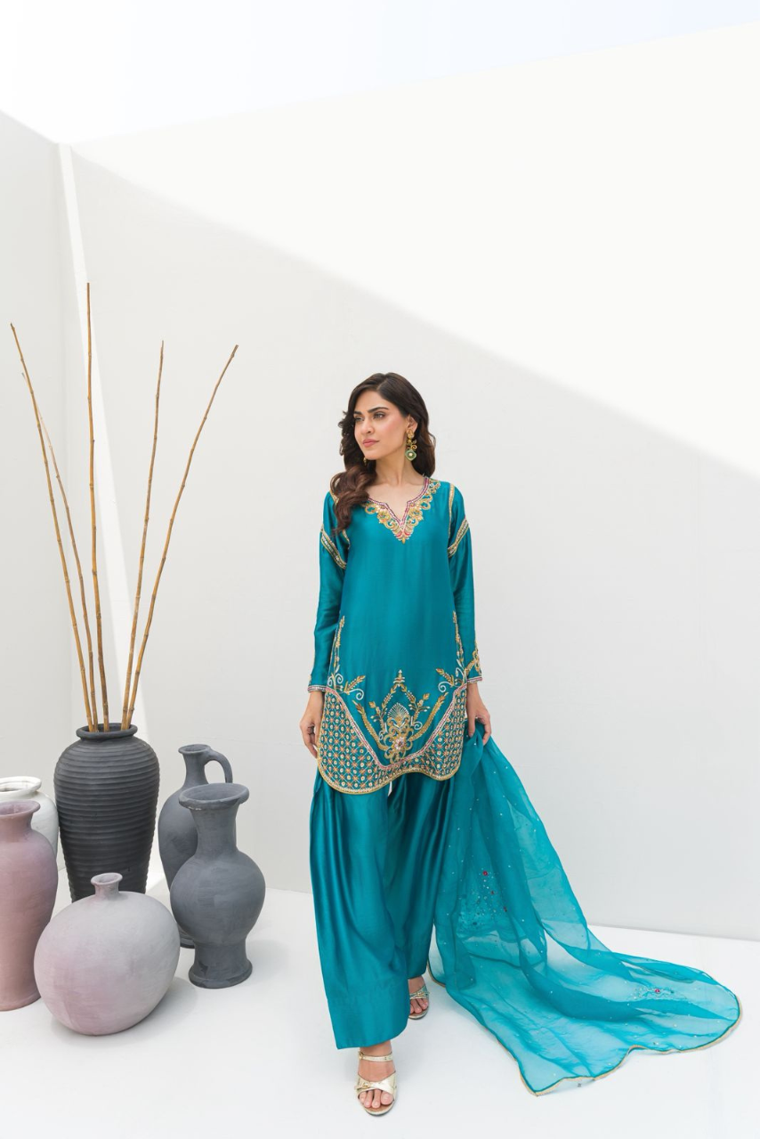 A serene sea green ensemble crafted in Pure Sheesha Silk