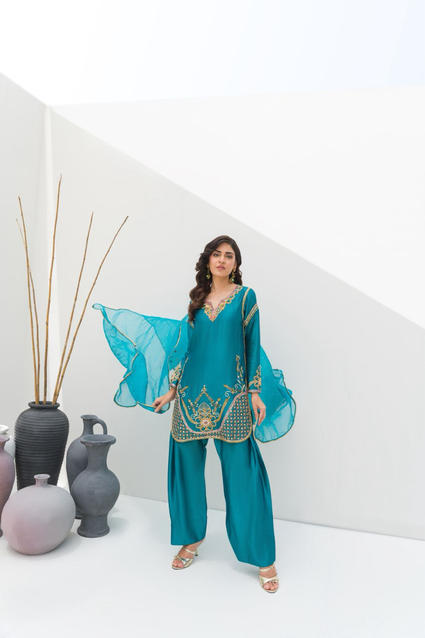 A serene sea green ensemble crafted in Pure Sheesha Silk