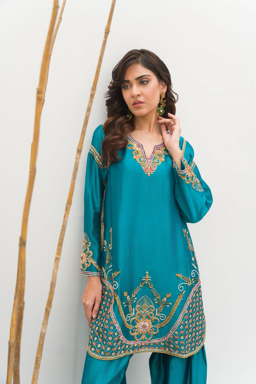 A serene sea green ensemble crafted in Pure Sheesha Silk